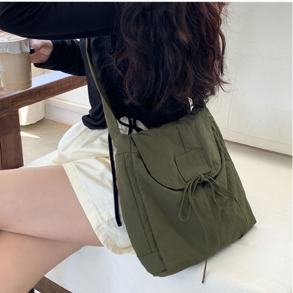 Interior Design Style - Bolso cruzado con lazo de nailon